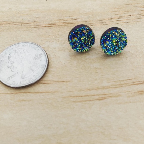 Blue reflective stud earrings. - Picture 2 of 3